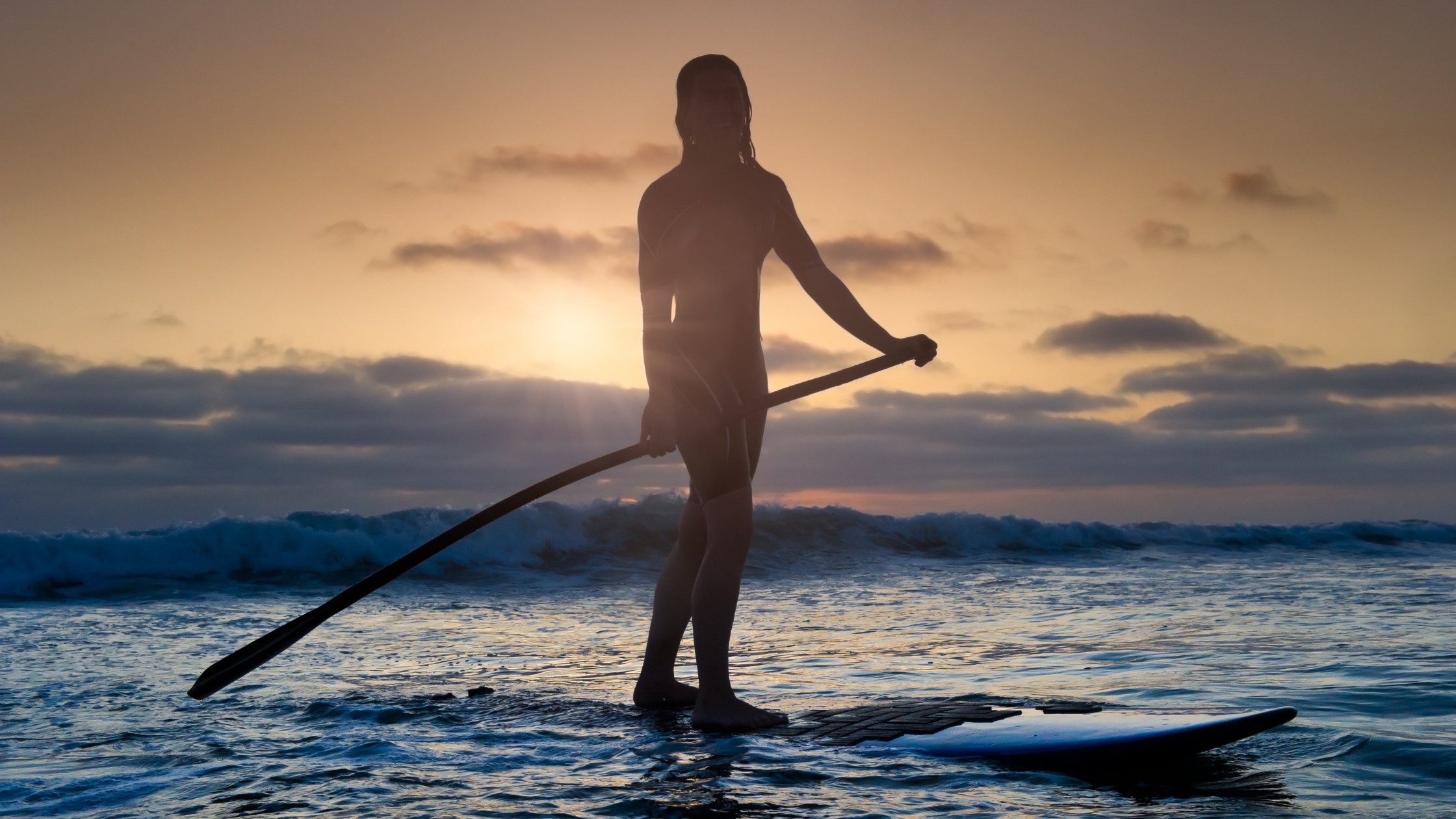 Sunrise stand-up paddleboarding on calm Sea of Cortez waters near San José del Cabo